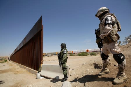 Members of the Mexican National Guard are seen at the U.S. and Mexico border to stop migrants from crossing into the United States, as seen from Anapra, in Ciudad Juarez