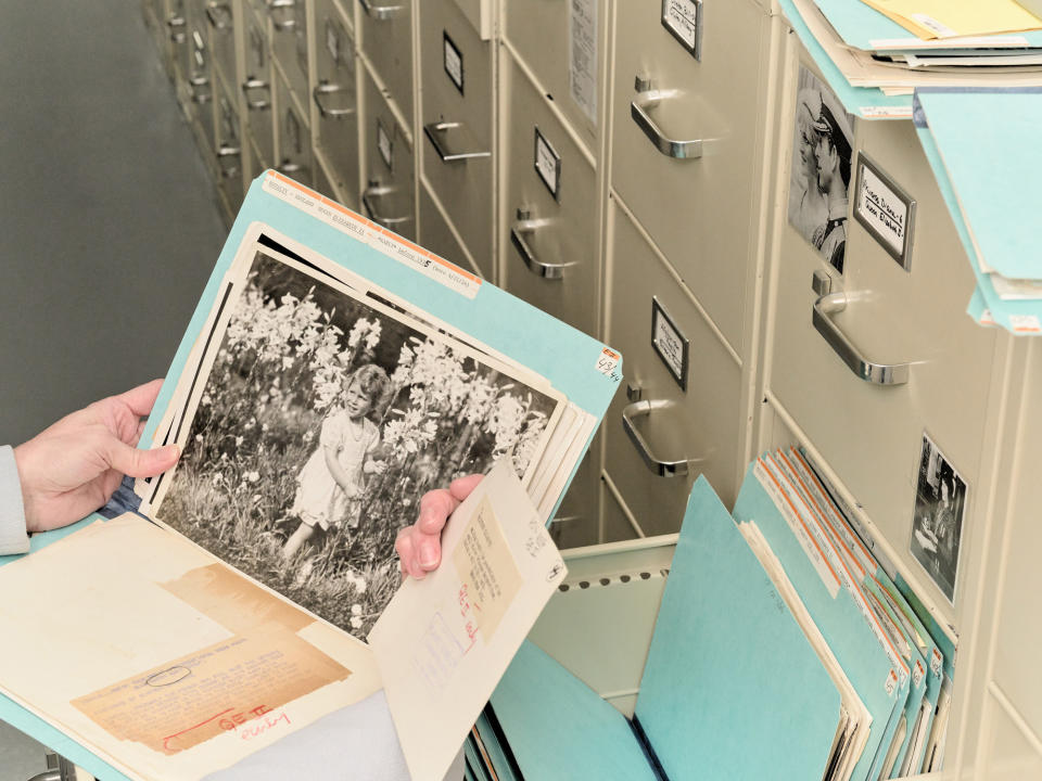 Stauffer looks through early images of Queen Elizabeth II.