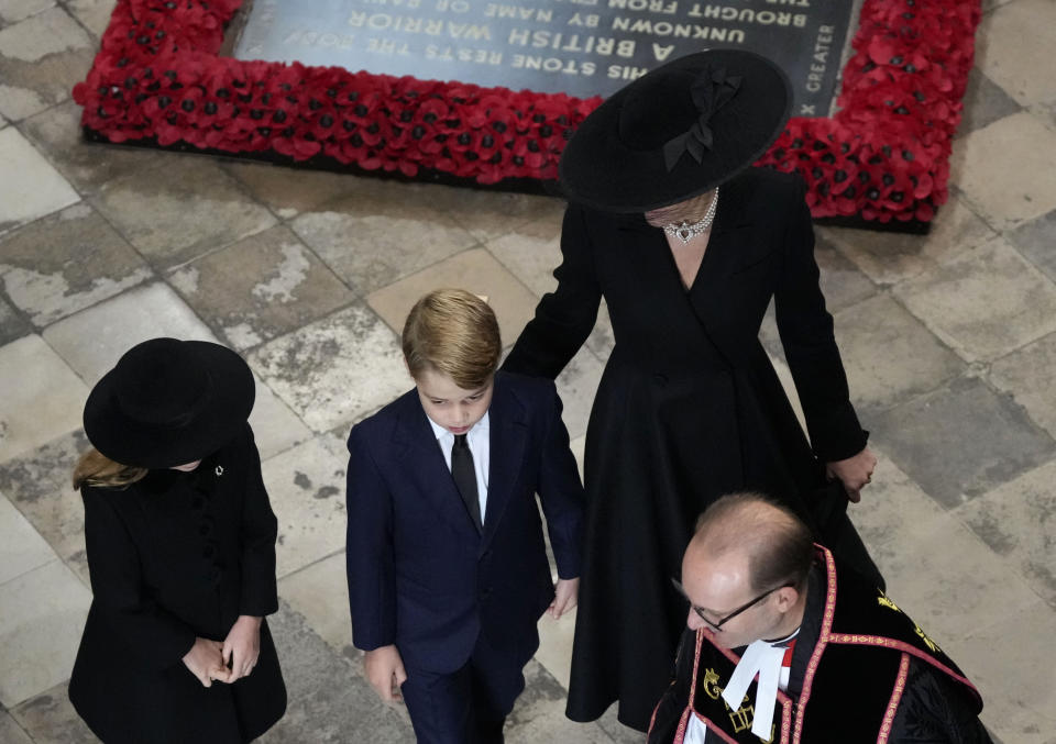 <p>LONDON, ENGLAND - SEPTEMBER 19: (L-R) Princess Charlotte of Wales, Prince George of Wales and Catherine, Princess of Wales arrive for the State Funeral of Queen Elizabeth II at Westminster Abbey on September 19, 2022 in London, England. Elizabeth Alexandra Mary Windsor was born in Bruton Street, Mayfair, London on 21 April 1926. She married Prince Philip in 1947 and ascended the throne of the United Kingdom and Commonwealth on 6 February 1952 after the death of her Father, King George VI. Queen Elizabeth II died at Balmoral Castle in Scotland on September 8, 2022, and is succeeded by her eldest son, King Charles III. (Photo by Frank Augstein - WPA Pool/Getty Images)</p> 