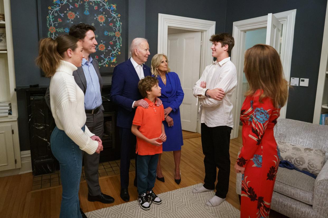 Justin Trudeau seen with him family welcoming Joe and Jill Biden in Rideau Cottage. Xavier, his oldest son, is the only one seen in socks.