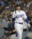 Los Angeles Dodgers' Enrique Hernandez reacts after striking out during the third inning of Game 4 of the National League Championship Series baseball game against the Milwaukee Brewers Tuesday, Oct. 16, 2018, in Los Angeles. (AP Photo/Jae Hong)