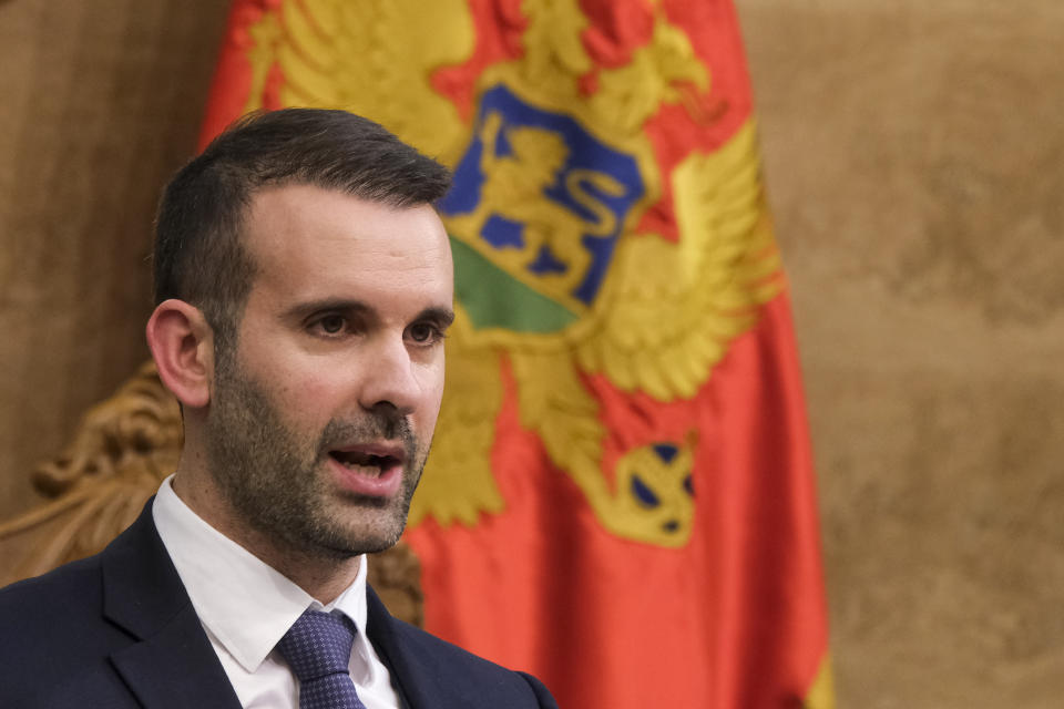 Montenegro's new Prime Minister Milojko Spajic speaks during a parliament session in Montenegro's capital Podgorica, Monday, Oct. 30, 2023. European Commission President Ursula von der Leyen is scheduled to hold talks with the new Montenegrin prime minister on Tuesday in the capital, Podgorica, as a part of her tour of the Western Balkan states seeking EU membership. (AP Photo/Risto Bozovic)