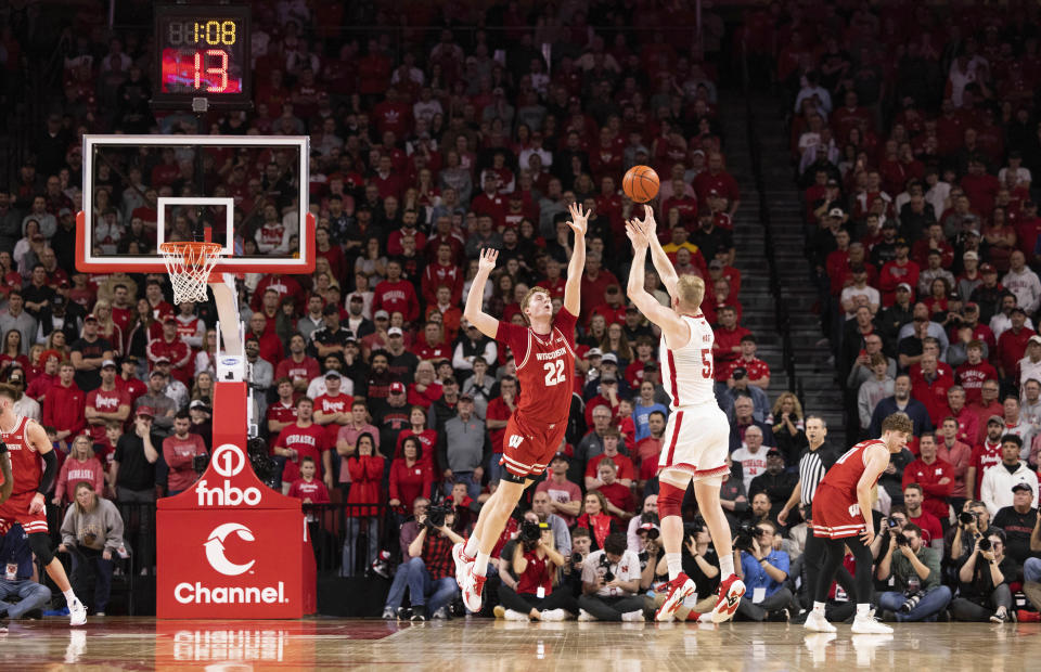 Nebraska's Rienk Mast (51) shoots a three pointer against Wisconsin's Steven Crowl (22) during the second half of an NCAA college basketball game Thursday, Feb. 1, 2024, in Lincoln, Neb. Nebraska defeated Wisconsin 80-72 in overtime. (AP Photo/Rebecca S. Gratz)