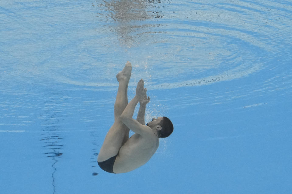 Giorgio Minisini of Italy competes in the men's solo technical final of artistic swimming at the World Aquatics Championships in Doha, Qatar, Monday, Feb. 5, 2024. (AP Photo/Lee Jin-man)