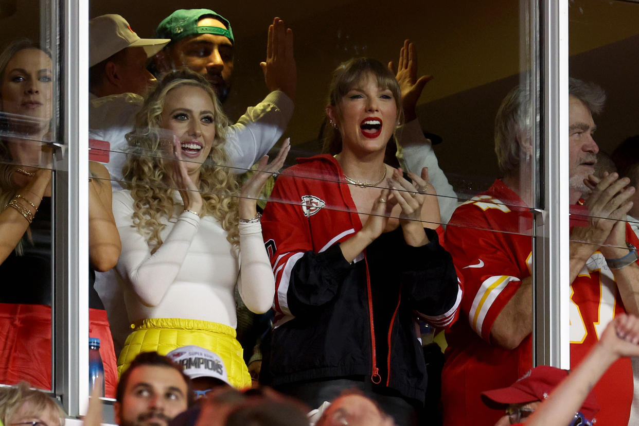 KANSAS CITY, MISSOURI - OCTOBER 12: Brittany Mahomes and Taylor Swift celebrate a touchdown by the Kansas City Chiefs against the Denver Broncos during the second quarter at GEHA Field at Arrowhead Stadium on October 12, 2023 in Kansas City, Missouri. (Photo by Jamie Squire/Getty Images)