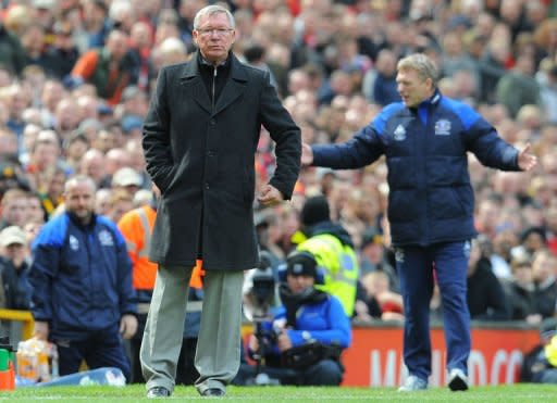 Manchester United manager Sir Alex Ferguson attends the English Premier League football match between Manchester United and Everton at Old Trafford in Manchester. Ferguson has said the upcoming clash with Premier League title rivals Manchester City represents the most important derby match of his career