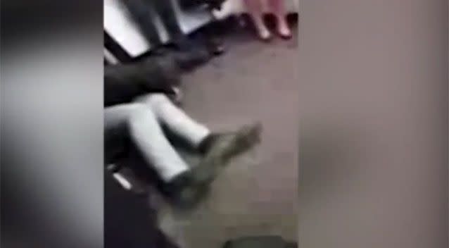 The fight continues until one man appears to flip the other over in the footage. Source: Supplied.