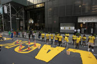 Black Lives Matter is painted on Fifth Avenue in front of Trump Tower, Thursday, July 9, 2020, in New York. (AP Photo/Mark Lennihan)