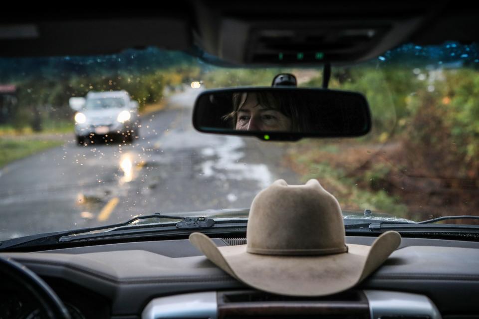 Katie Delbar rides in a truck with her daughter near their family ranch in Potter Valley in Mendocino County, California.