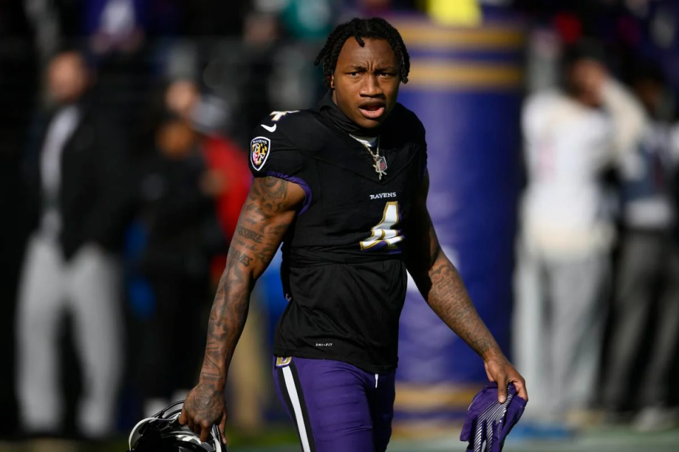 Baltimore Ravens wide receiver Zay Flowers (4) works out before an NFL football game against the Miami Dolphins, Sunday, Dec. 31, 2023, in Baltimore. (AP Photo/Nick Wass)