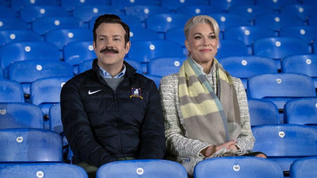  From the Apple TV+ press site: Jason Sudeikis and Hannah Waddingham sitting in the stands together in the Season 3 finale of Ted Lasso. . 