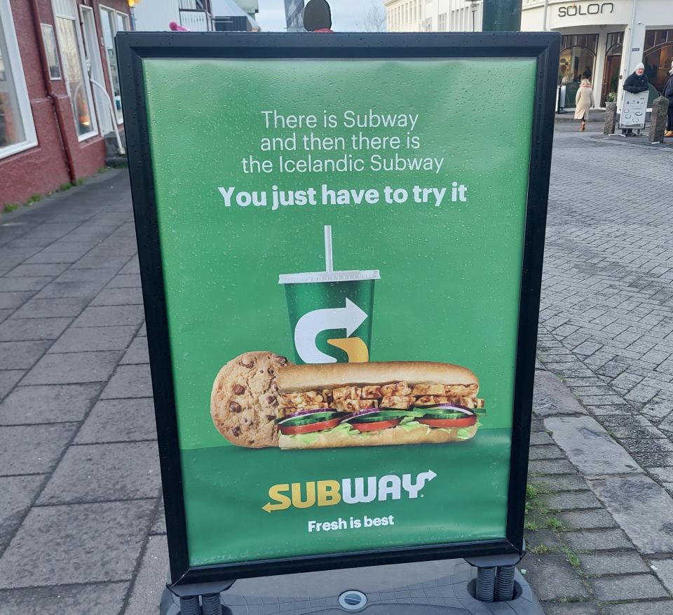 A sign in a street in Reykjavik, Iceland advertising Subway