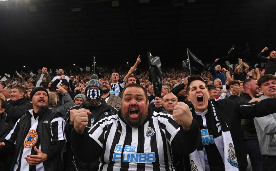 Newcastle fans in the Gallowgate End celebrate the opening goal scored by Callum Wilson (Getty)