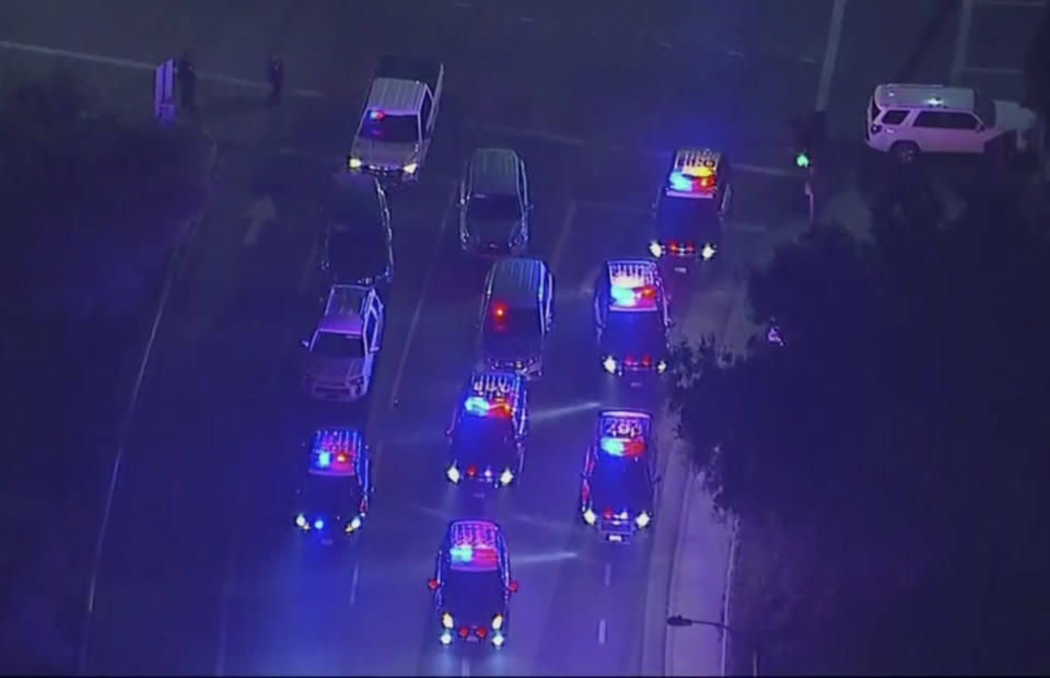 Police vehicles block an intersection in the vicinity of a mass shooting in Thousand Oaks, California. Source: AP