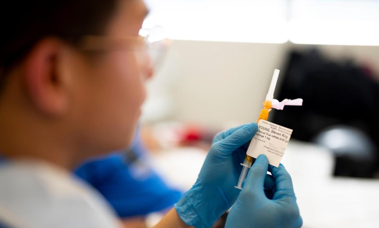 <span>A nurse prepares to give Steve Young, one of the first patients in the trial, his first jab at UCLH in London.</span><span>Photograph: Jordan Pettitt/PA</span>