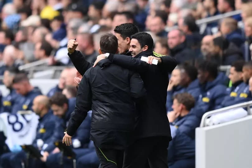 Arsenal manager celebrates Mikel Arteta with his coaching staff after an own goal from Tottenham Hotspur midfielder Pierre-Emile Hojbjerg
