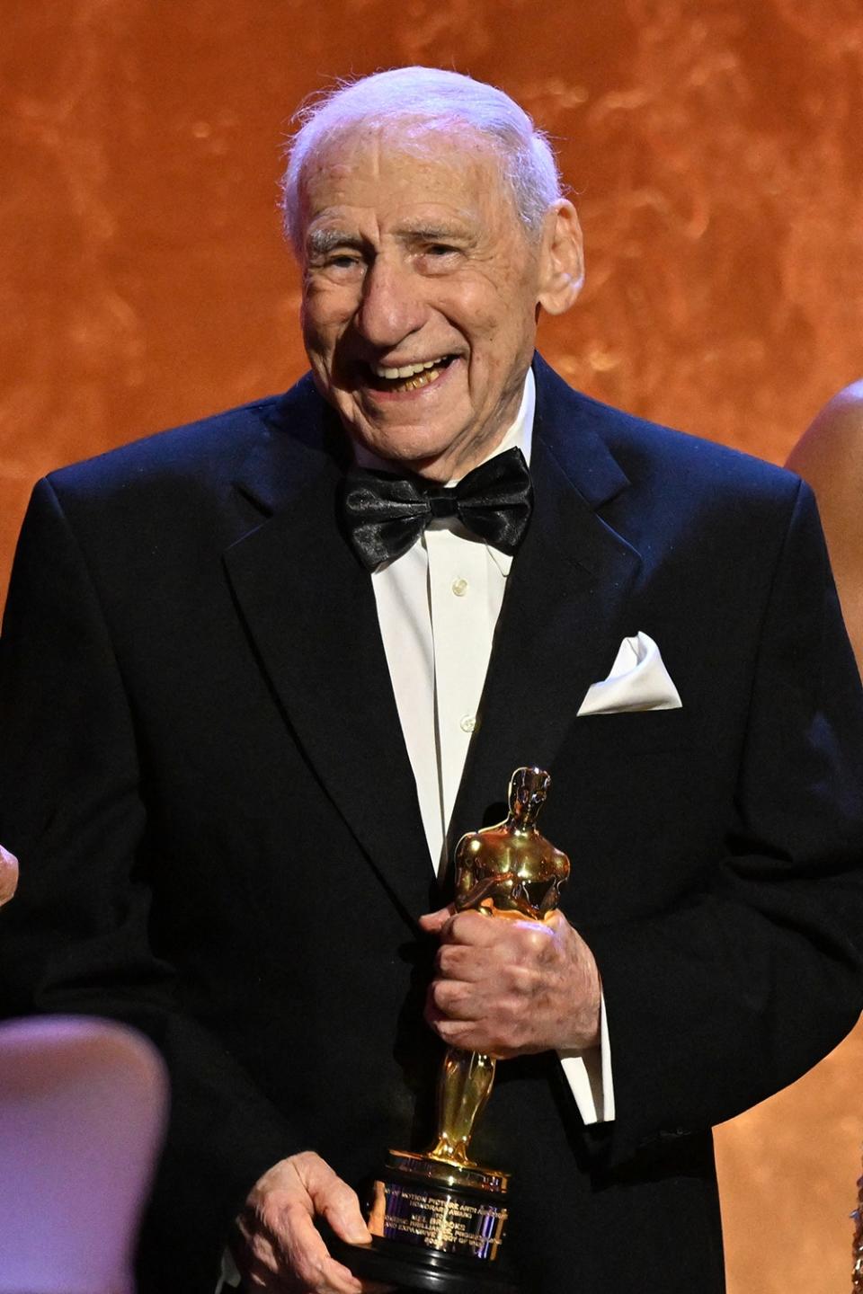 Mel Brooks holding his Oscar