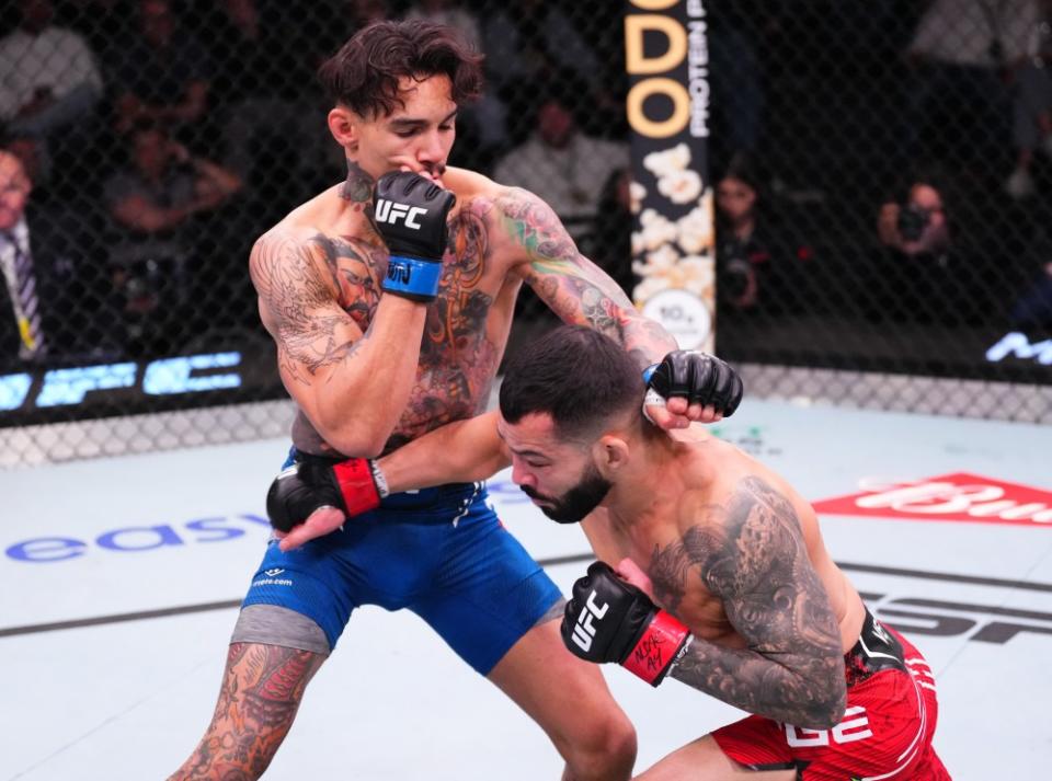 LAS VEGAS, NEVADA – FEBRUARY 10: (R-L) Dan Ige battles Andre Fili in a featherweight fight during the UFC Fight Night event at UFC APEX on February 10, 2024 in Las Vegas, Nevada. (Photo by Jeff Bottari/Zuffa LLC via Getty Images)