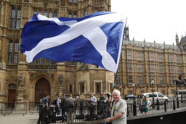 SNP MP's pose in front of Parliament following election