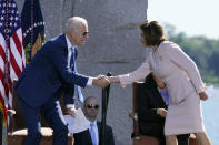 President Joe Biden shakes hands with House Speaker Nancy Pelosi of Calif., during an event marking the 10th anniversary of the dedication of the Martin Luther King, Jr. Memorial in Washington, Thursday, Oct. 21, 2021. (AP Photo/Susan Walsh)