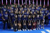 The USA Olympic swim team poses for a picture after the U.S. Olympic Swim Trials on Sunday, June 20, 2021, in Omaha, Neb. (AP Photo/Charlie Neibergall)