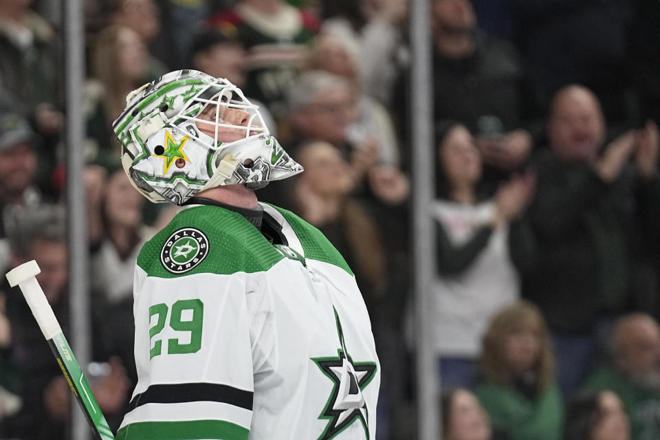 Dallas Stars goaltender Jake Oettinger (29) looks up at the videoboard after giving up a goal to Minnesota Wild right wing Mats Zuccarello during the third period of an NHL hockey game Friday, Feb. 17, 2023, in St. Paul, Minn. (AP Photo/Abbie Parr)