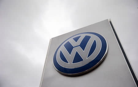 A VW sign is seen outside a Volkswagen dealership in London, Britain November 5, 2015. REUTERS/Suzanne Plunkett