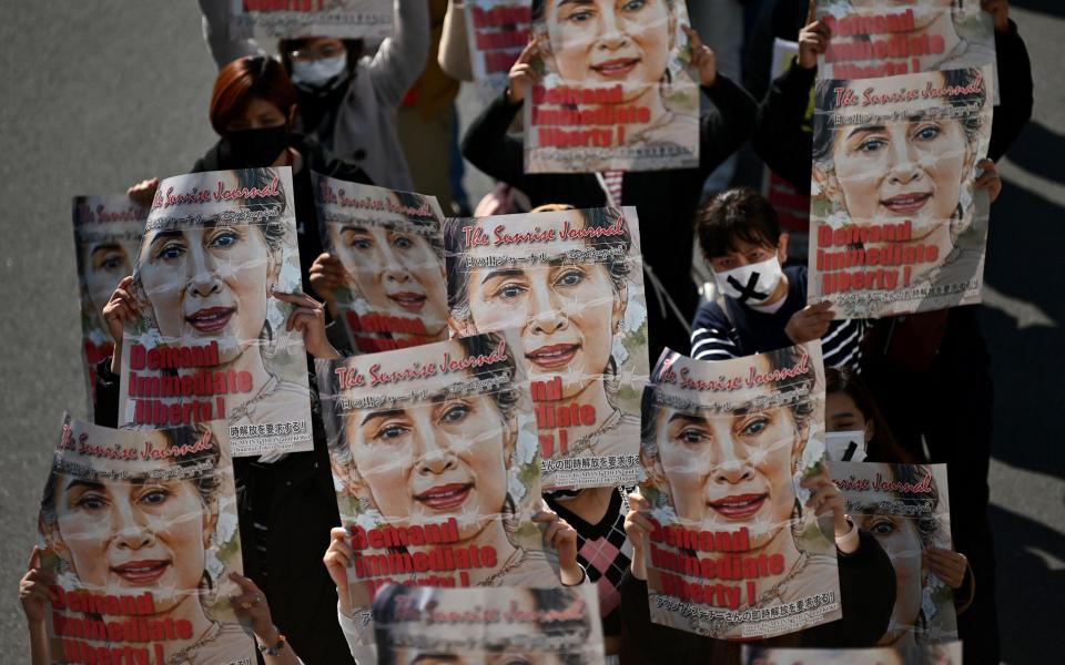 Activists in Tokyo take part in a protest against the military coup - CHARLY TRIBALLEAU/AFP