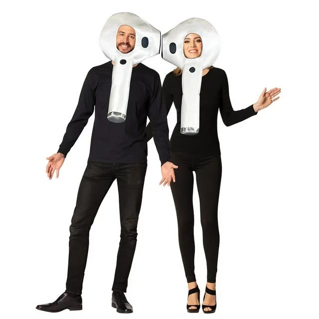 two models wearing block jumpsuits and earbud face masks