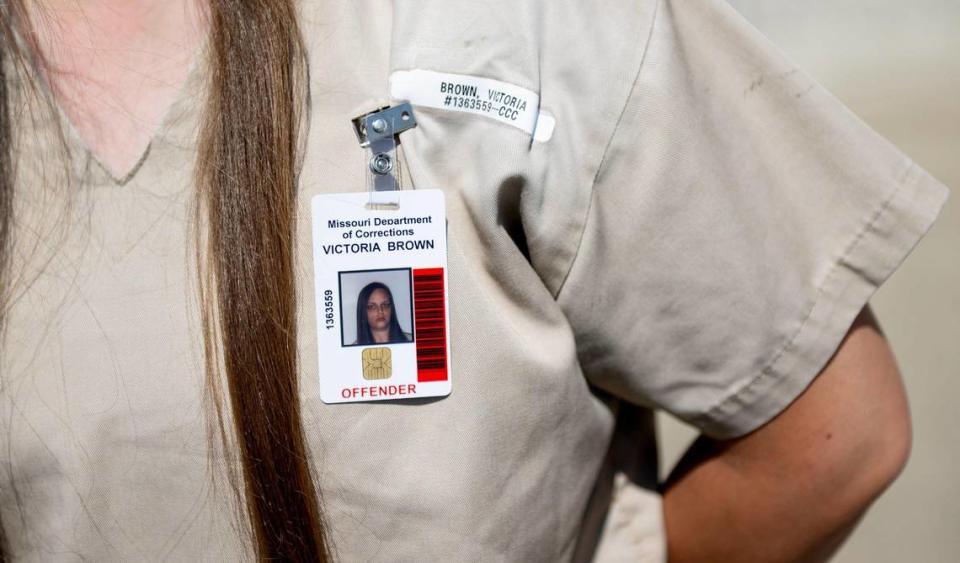 Victoria Brown displays her identification badge at the Chillicothe Correctional Center. When she is released from prison, Brown said, she wants to reconnect with her daughter, who will be an adult then. And she hopes to earn a college degree.