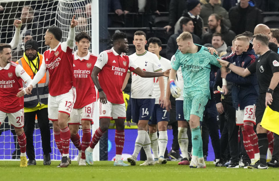 Players are in incident during the English Premier League soccer match between Tottenham Hotspur and Arsenal at the Tottenham Hotspur Stadium in London, England, Sunday, Jan. 15, 2023. (AP Photo/Frank Augstein)