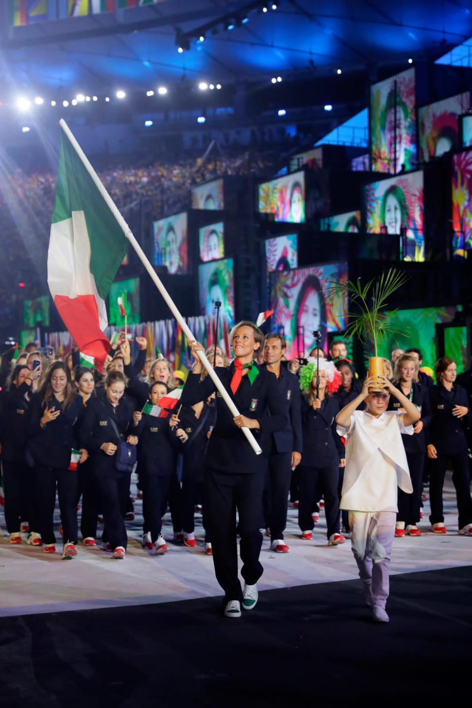 <p>In all-black outfits designed by Armani, the Italians looked like chic fashion ninjas, rather than athletes.</p><p><i>(Photo: Getty Images)</i><br></p>