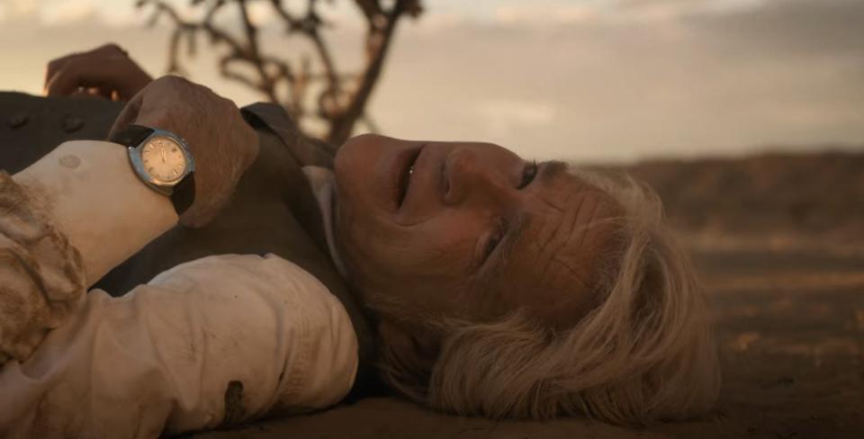 Brenner lying on a desert ground in "Stranger Things"