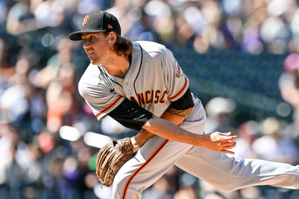 DENVER, CO - SEPTEMBER 26: Kevin Gausman #34 of the San Francisco Giants pitches against the Colorado Rockies in the first inning of a game at Coors Field on September 26, 2021 in Denver, Colorado. (Photo by Dustin Bradford/Getty Images)