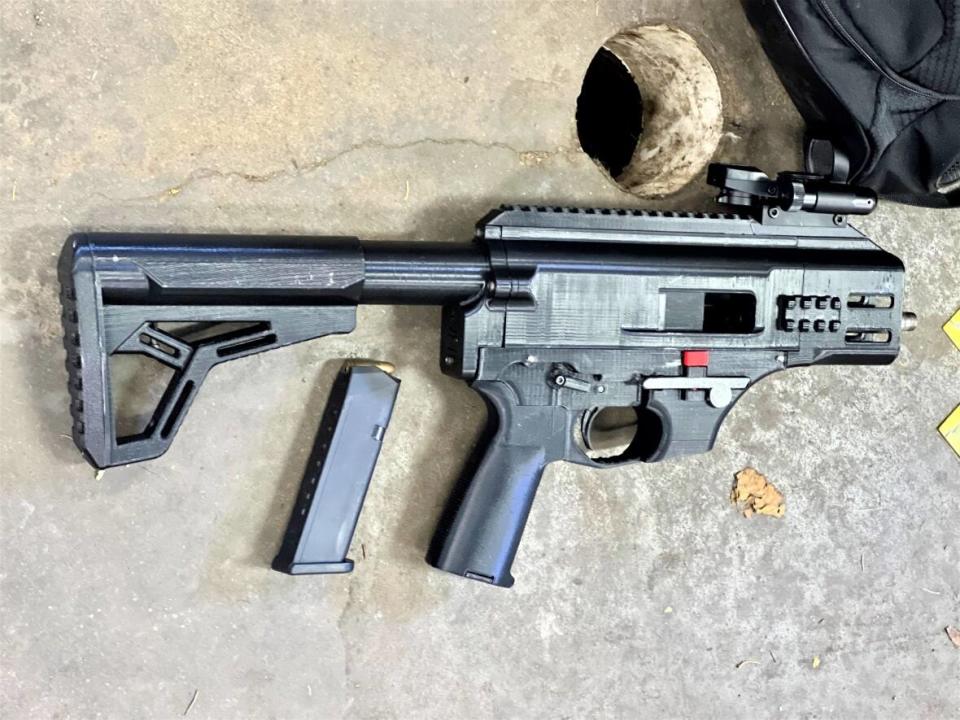 Police say this weapon was created in part with a 3D printer. They're investigating how it ended up in a garage in East Preston, N.S. (RCMP - image credit)