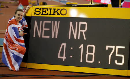 Athletics - IAAF World Indoor Tour - Birmingham Indoor Grand Prix - Arena Birmingham, Birmingham, Britain - February 16, 2019 Britain's Laura Muir celebrates winning the women's one mile Final and setting a new national indoor record Action Images via Reuters/Matthew Childs