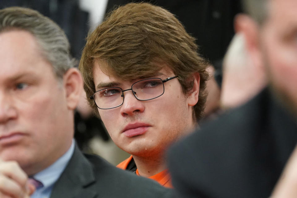 Convicted mass shooter Payton Gendron weeps as he listens to impact statements from relatives of the victims at his sentencing hearing in Buffalo, N.Y., on Wednesday. (Derek Gee/Pool via Reuters)