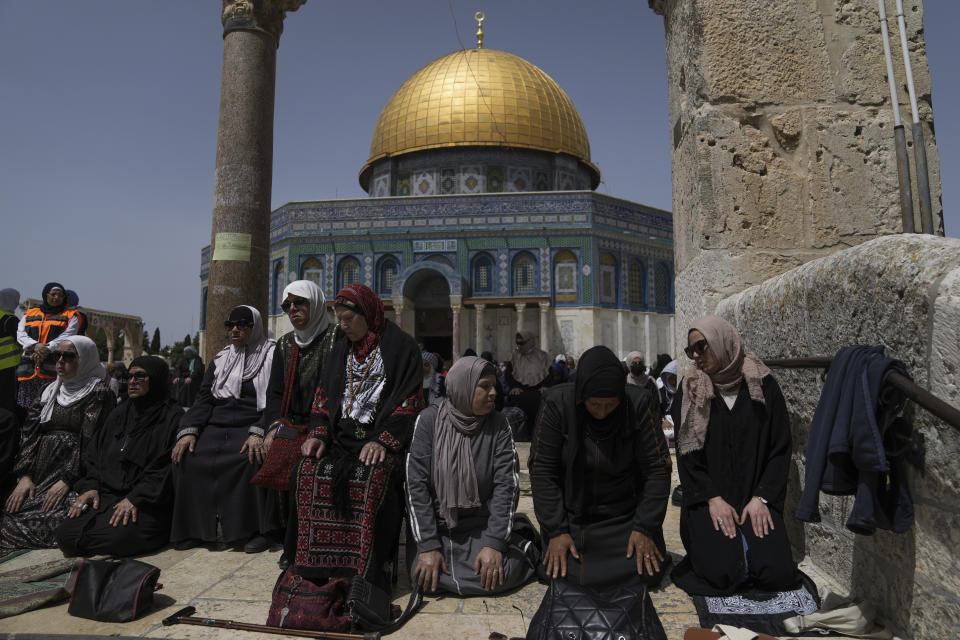 Muslim worshippers perform Friday prayers by the Dome of Rock at the Al-Aqsa Mosque compound in the Old City of Jerusalem during the Muslim holy month of Ramadan, Friday, April 7, 2023. (AP Photo/Mahmoud Illean)