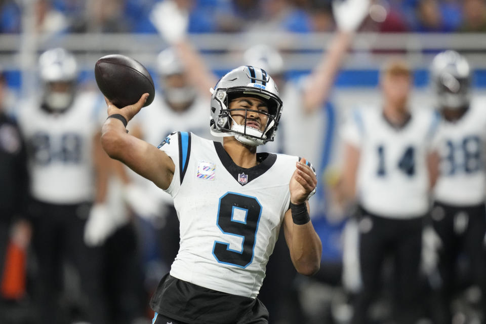 Carolina Panthers quarterback Bryce Young (9) throws a touchdown pass in the second half of an NFL football game against the Detroit Lions in Detroit, Sunday, Oct. 8, 2023. (AP Photo/Carlos Osorio)