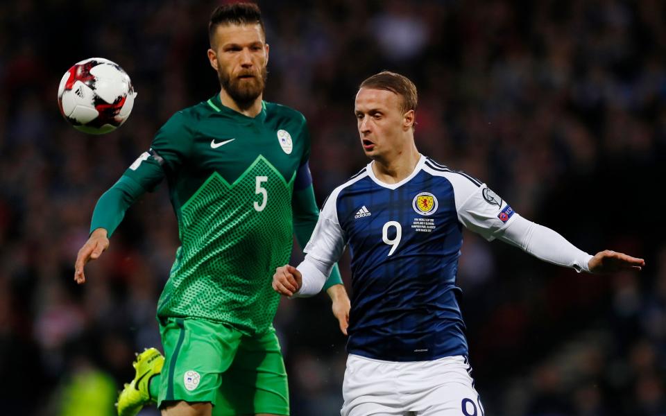 Britain Football Soccer - Scotland v Slovenia - 2018 World Cup Qualifying European Zone - Group F - Hampden Park, Glasgow, Scotland - 26/3/17 Slovenia's Bostjan Cesar in action with Scotland's Leigh Griffiths Action Images via Reuters / Jason Cairnduff - Credit: REUTERS