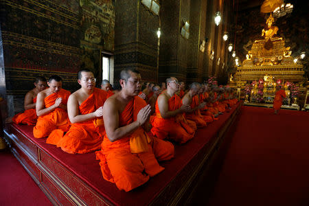 Buddhist monks pray during the coronation of King Maha Vajiralongkorn in Bangkok, Thailand, May 4, 2019. REUTERS/Soe Zeya Tun