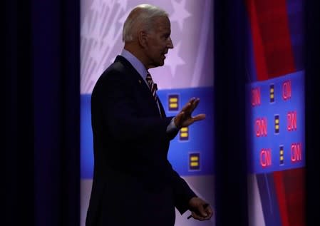 Democratic 2020 U.S. presidential candidate and former Vice President Joe Biden walks during a televised townhall on CNN dedicated to LGBTQ issues in Los Angeles, California