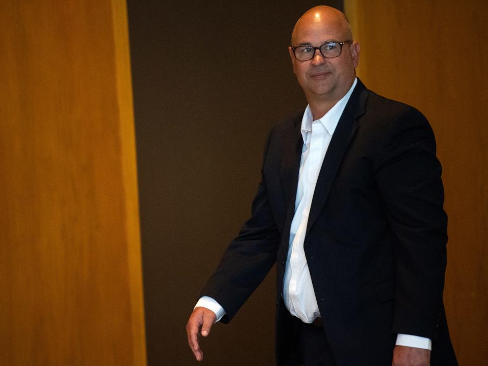 Former Tennessee football head coach Jeremy Pruitt leaves for a lunch break during an NCAA infractions hearing at the Westin Cincinnati on April 19, 2023.