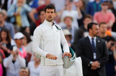 Tennis - Wimbledon - London, Britain - July 12, 2017 Serbia’s Novak Djokovic after he retires from his quarter final match against Czech Republic’s Tomas Berdych with an injury REUTERS/Matthew Childs