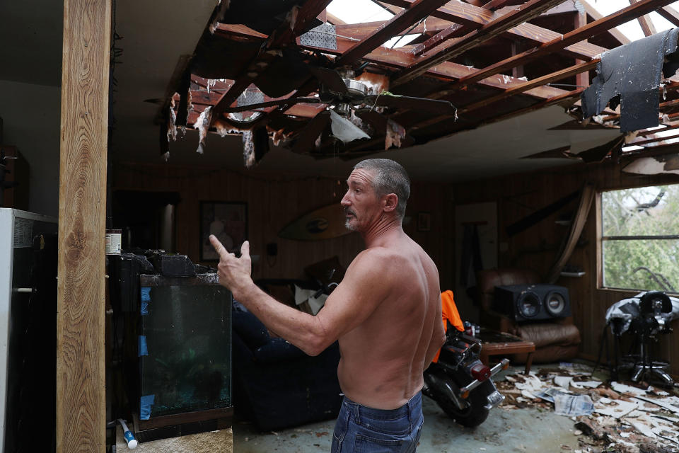 Aaron Tobias who said he lost everything stands in what is left of his home in Rockport. Mr. Tobias said he was able to get his wife and kids out before the storm arrived but he stayed there and rode it out.&nbsp;