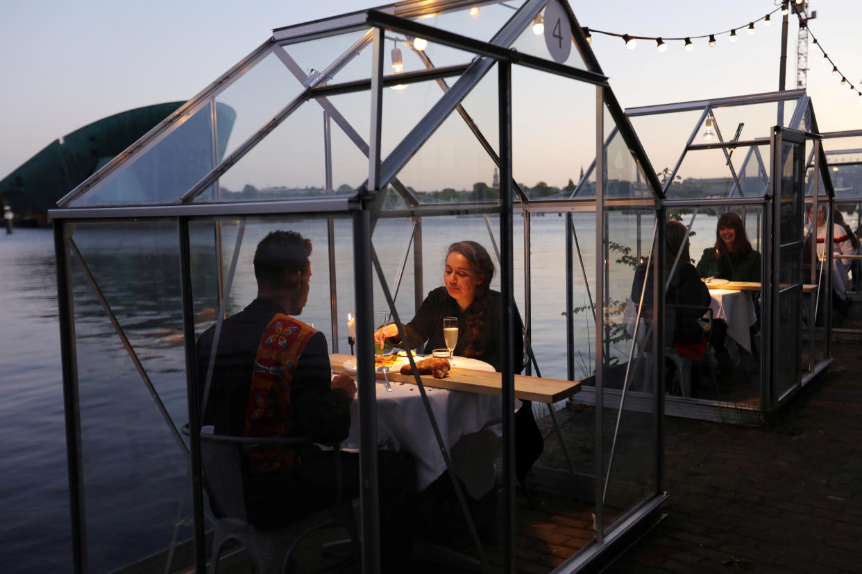 "Quarantine greenhouses" are tested at a restaurant in Amsterdam. (Photo: Eva Plevier/Reuters)