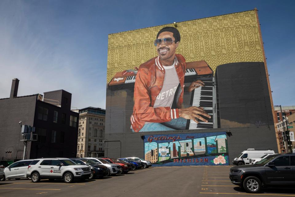 A massive mural depicting Motown legend Stevie Wonder overlooking a downtown Detroit parking lot, April 18, 2024.