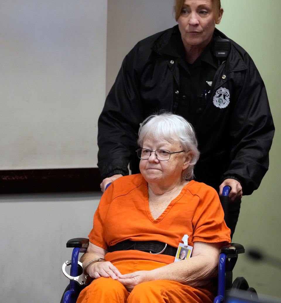 Ellen Gilland, the woman accused of fatally shooting her terminally ill husband, is wheeled into a bond hearing at the S. James Foxman Justice Center in Daytona Beach, Friday, Feb. 10, 2023.