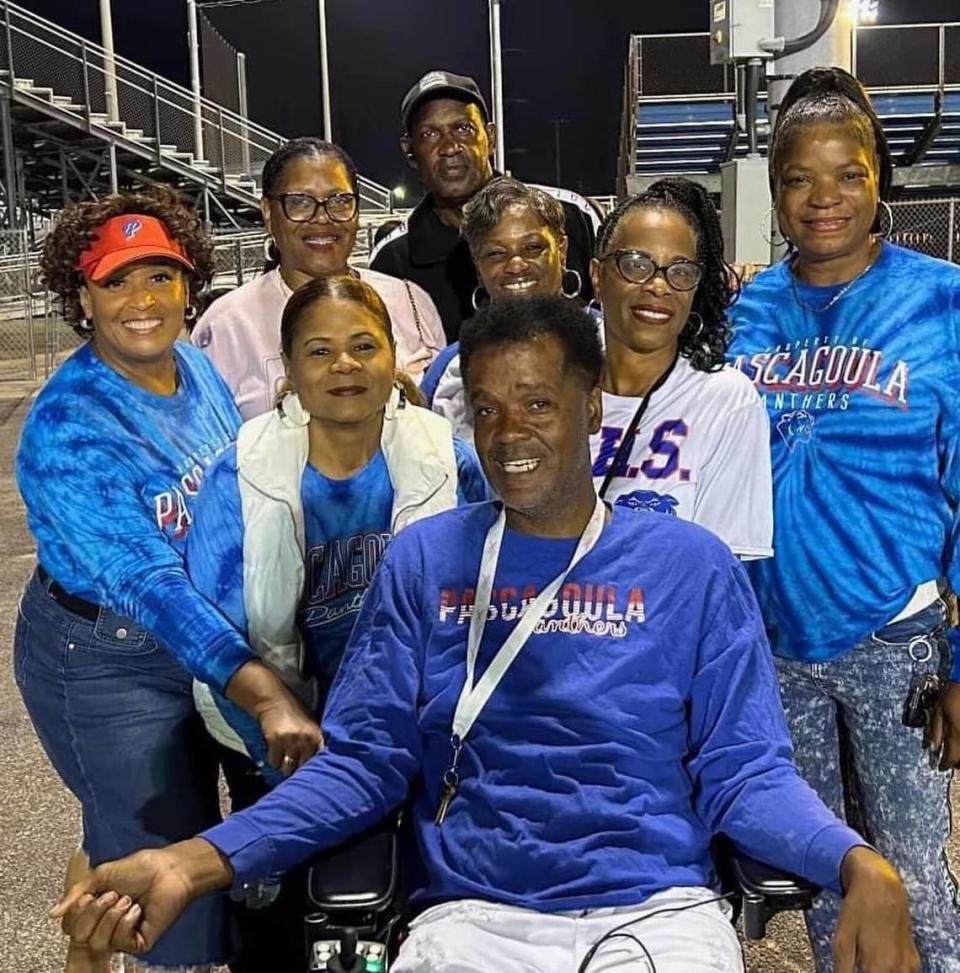 Jackie Davis regularly attended football and basketball games, where he ran his wheelchair up and down the sidelines to cheer for kids, his family said.