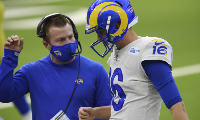 Head coach Sean McVay speaks with Jared Goff #16 of the Los Angeles Rams